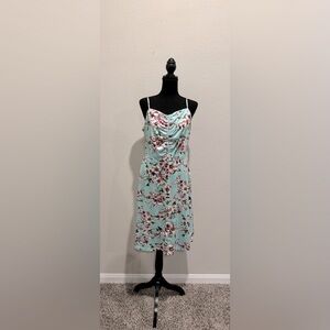 Korleyya Adjustable Woman’s Floral Spaghetti Strap Sundress.